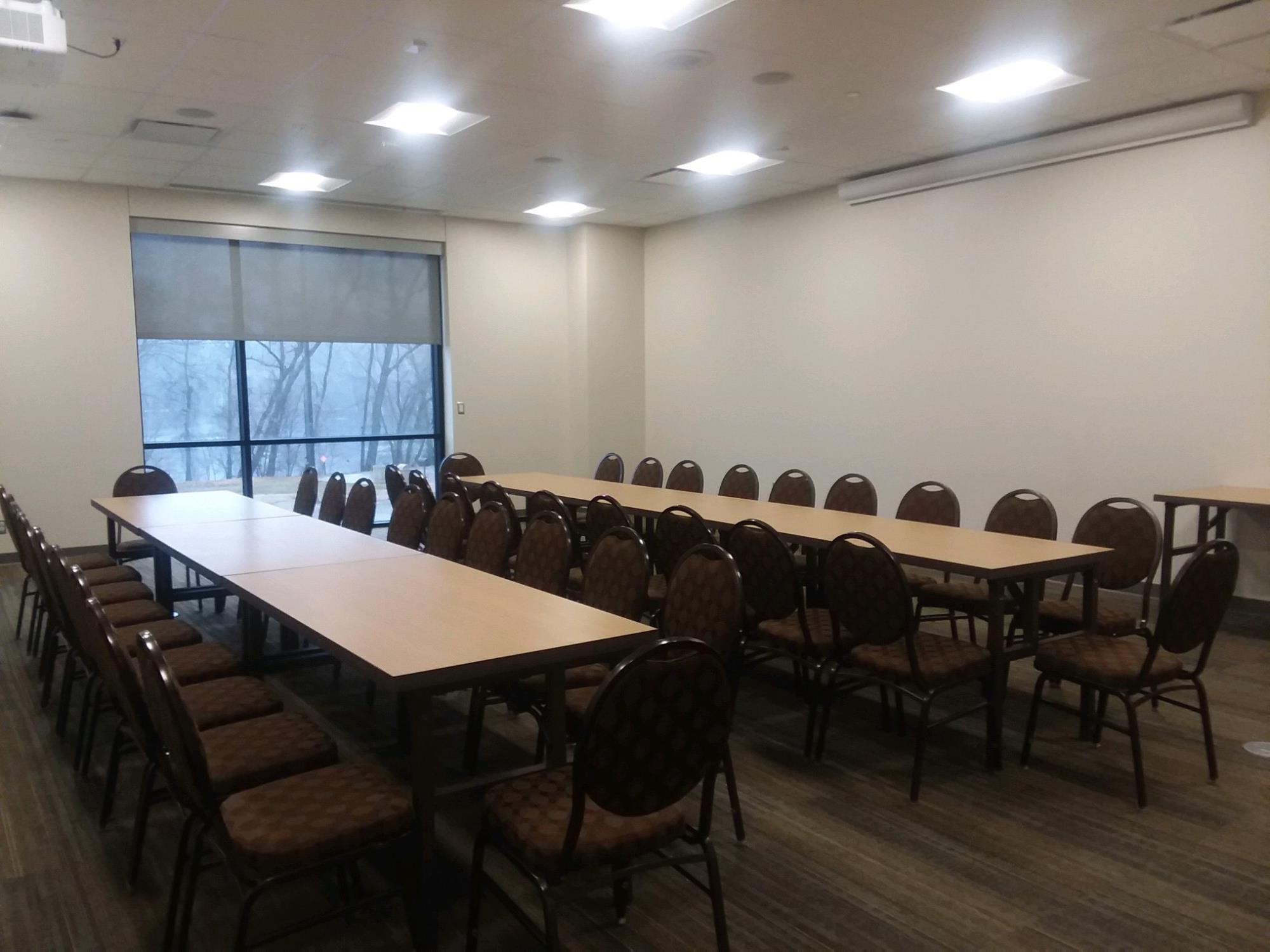 tables and chairs in an activity room